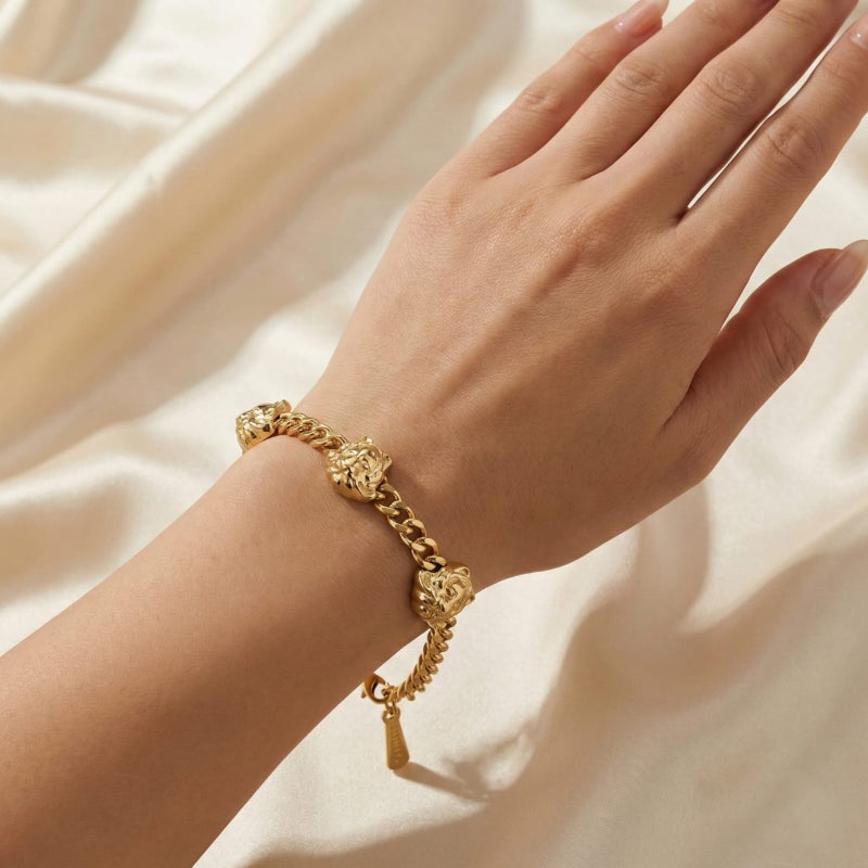 A stylish gold bracelet made of rust-resistant stainless steel, with a wide chain design and three luxurious prominent tiger-shaped heads, with an adjustable clasp to fit you. - Image 3